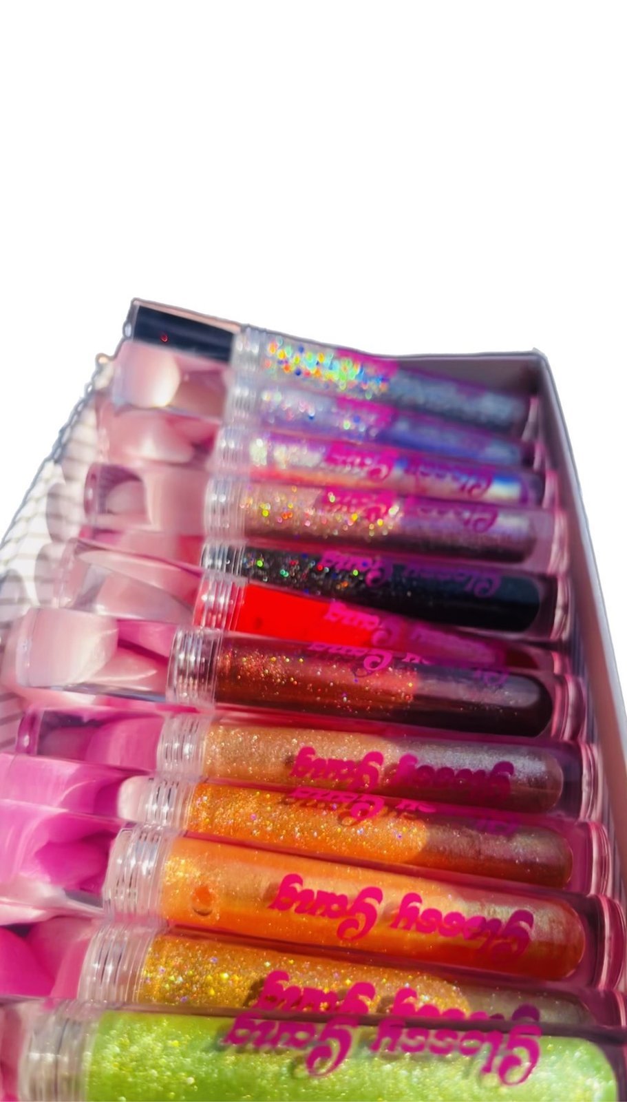 Glamorous Glitter Glossy Collection (box) - Glossy Gang Lip GlossClose - up of shimmering glitter gloss applied to lips, showcasing a sparkly, reflective finish."