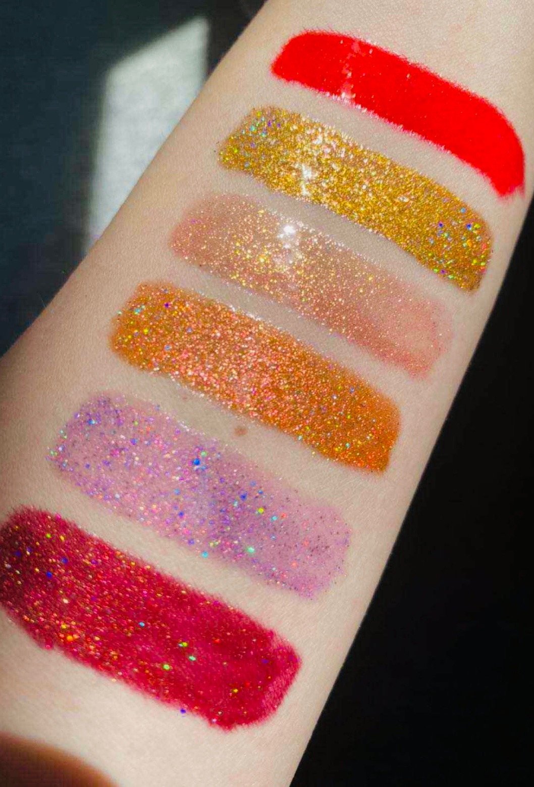 Glamorous Glitter Glossy Collection (box) - Glossy Gang Lip GlossClose - up of shimmering glitter gloss applied to lips, showcasing a sparkly, reflective finish."