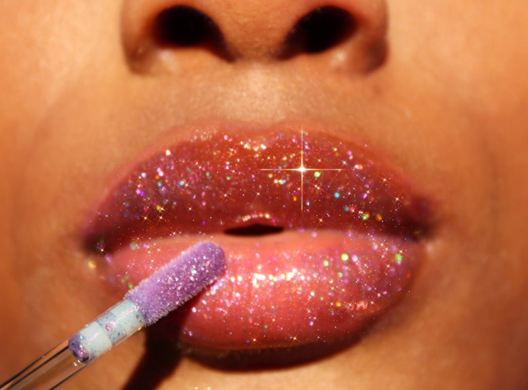 Purple Reign #12 - Glossy Gang Lip GlossClose - up of shimmering glitter gloss applied to lips, showcasing a sparkly, reflective finish."