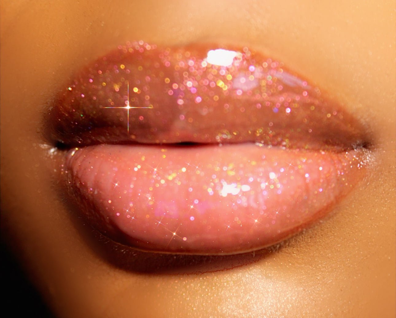 Sunshine #10 - Glossy Gang Lip GlossClose - up of shimmering glitter gloss applied to lips, showcasing a sparkly, reflective finish."