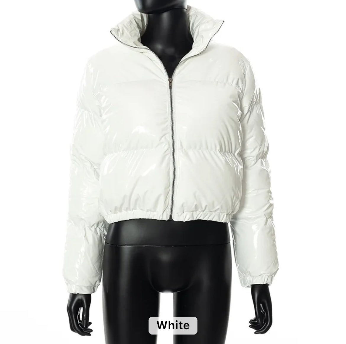 White Puffer Jacket (limited edition) - Glossy Gang Close - up of shimmering glitter gloss applied to lips, showcasing a sparkly, reflective finish."